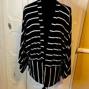 Maurices black with white stripes shrug sweater, size Medium